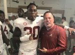 Mack-Wilson-and-Butch-Jones-enjoying-cigars.jpg